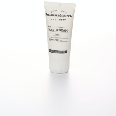 a tube of hand cream on a white surface